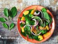 salad in orange bowl