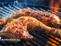 chicken thighs on a charcoal grill