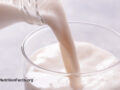 Milk pouring into a glass